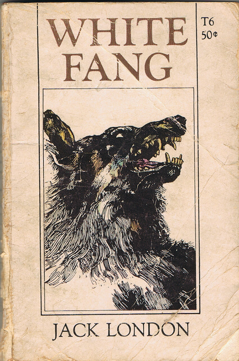 Black and white illustration of dog on old edition of White Fang