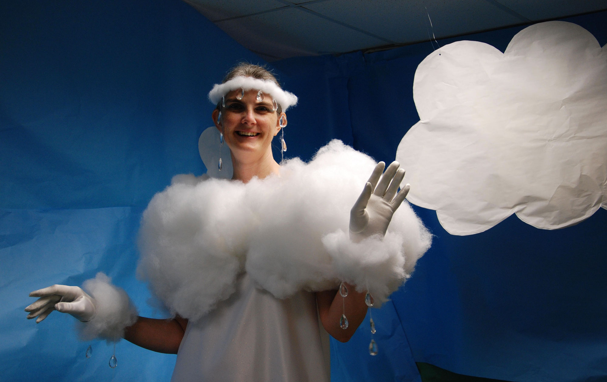 Woman dressed as cumulus cloud