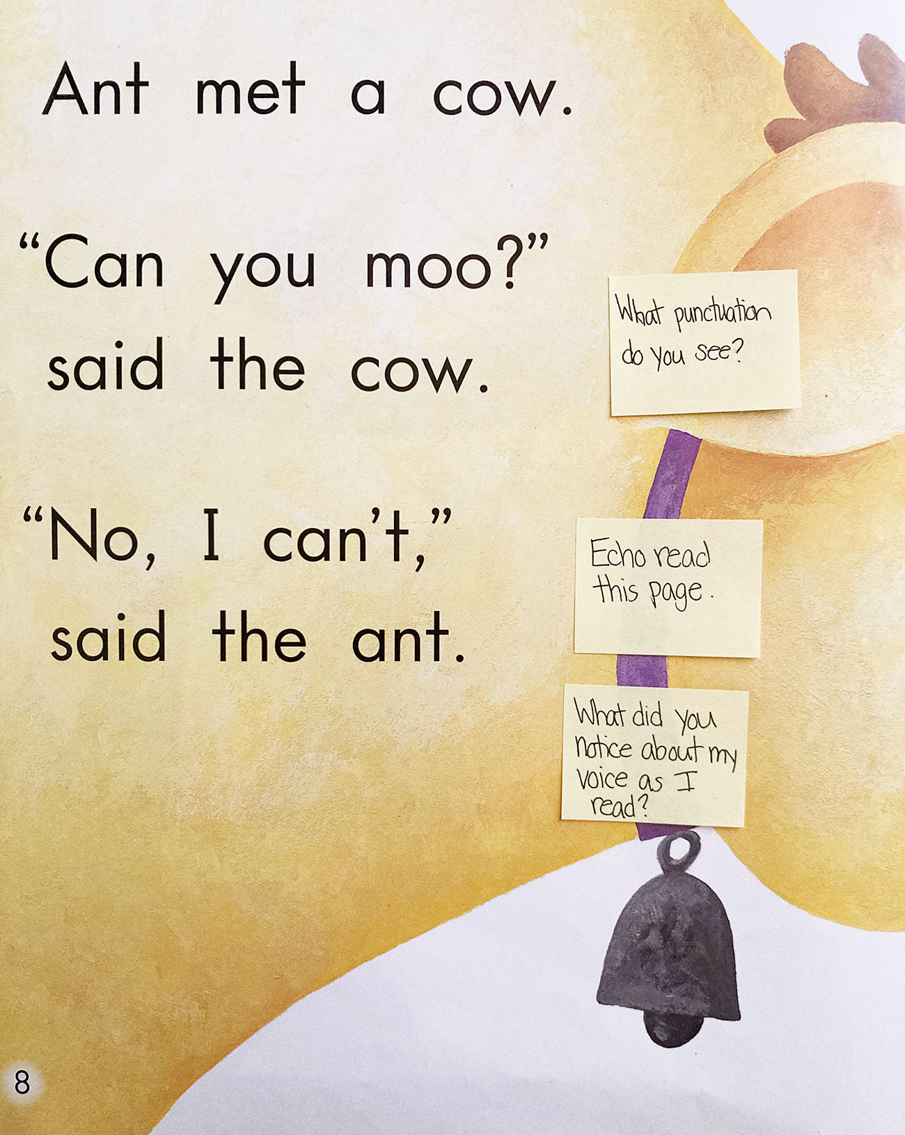 Page from predictable book showing text about a cow and an ant with post-it notes