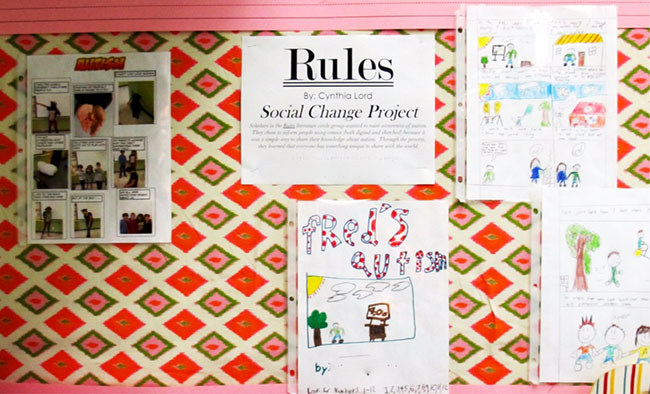 Figure 3. Classroom Bulletin Board With Lee's Social Change Project About Autism