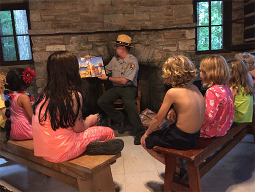 Park Ranger reading aloud