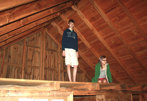Avery and Breece in the loft at The Little House Wayside