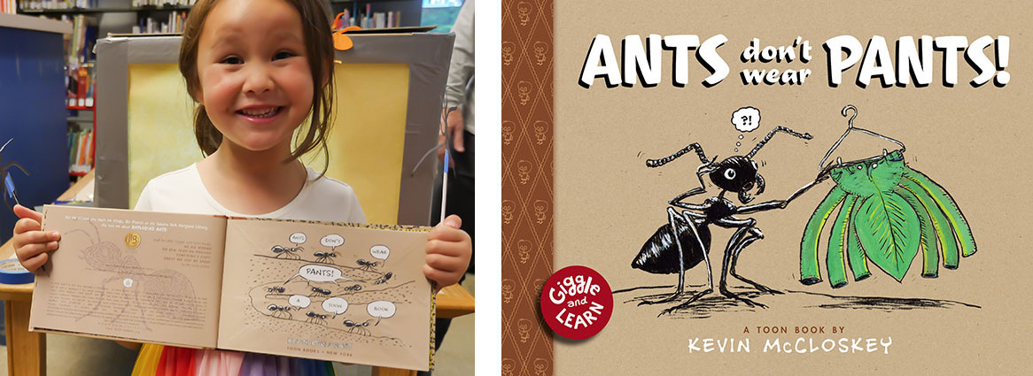 Young child holding Ants Don't Wear Pants picture book