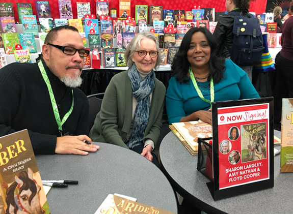 Ride to Remember authors Sharon Langley and Amy Nathan and illustrator Floyd Cooper at a book signing event