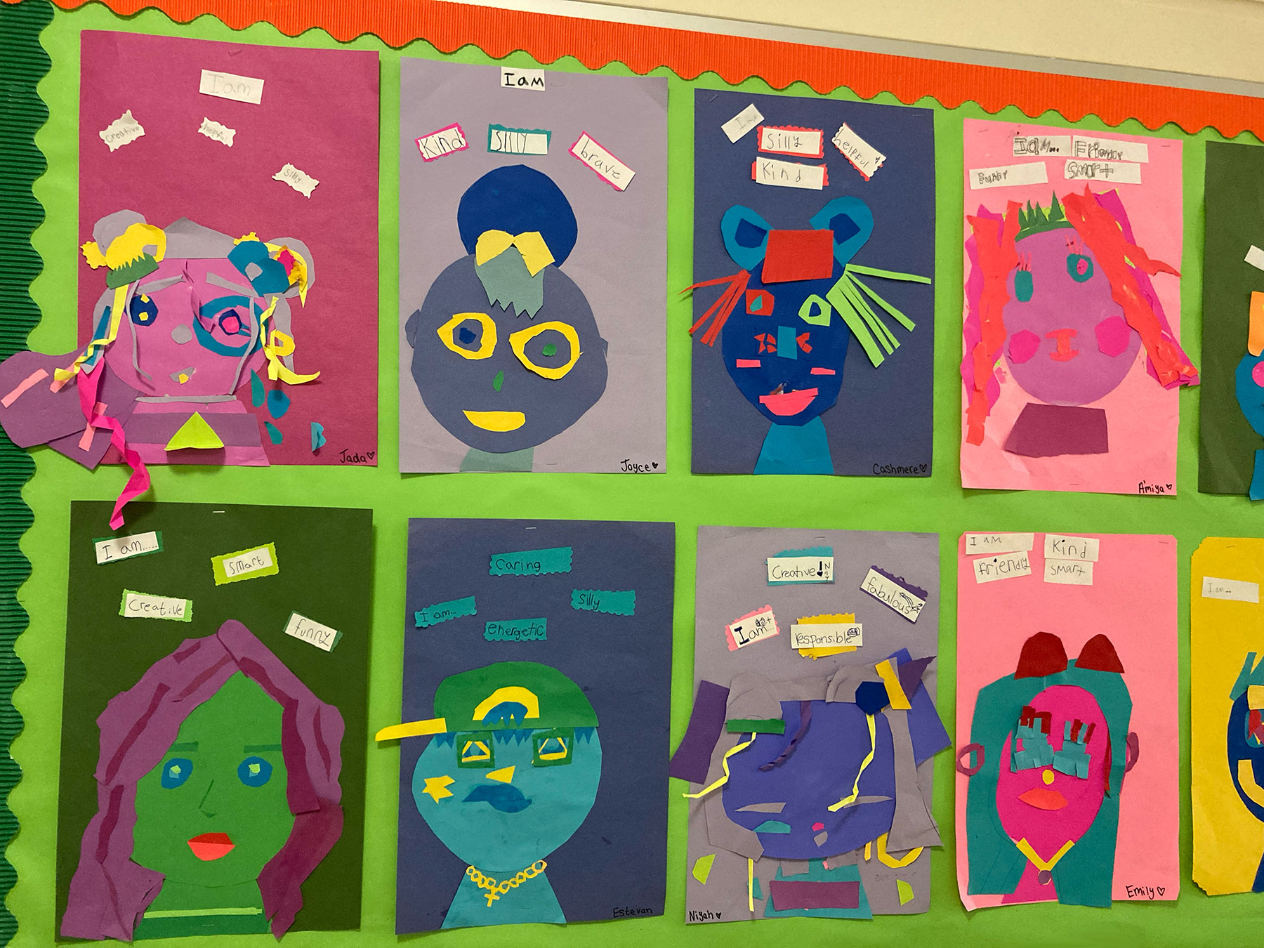 Display of collage portraits by students in elementary classroom