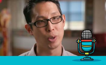 Graphic novelist Gene Yang video still with microphone graphic