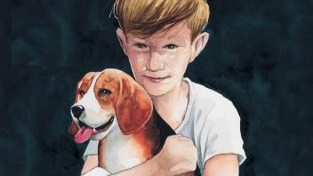 A boy hugging his Beagle dog
