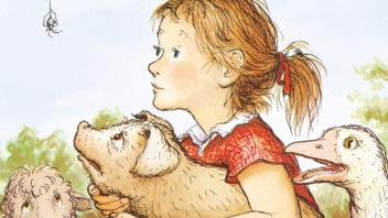 Young girl named Fern with her pig Wilbur looking at Charlotte the spider