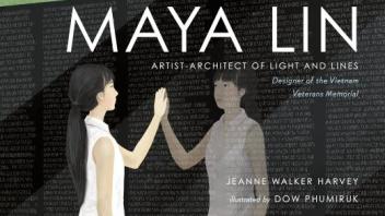 Maya Lin touching the wall of the Vietnam Memorial
