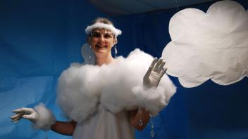 Woman dressed as cumulus cloud