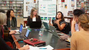 multicultural group of teachers in a roundtable session